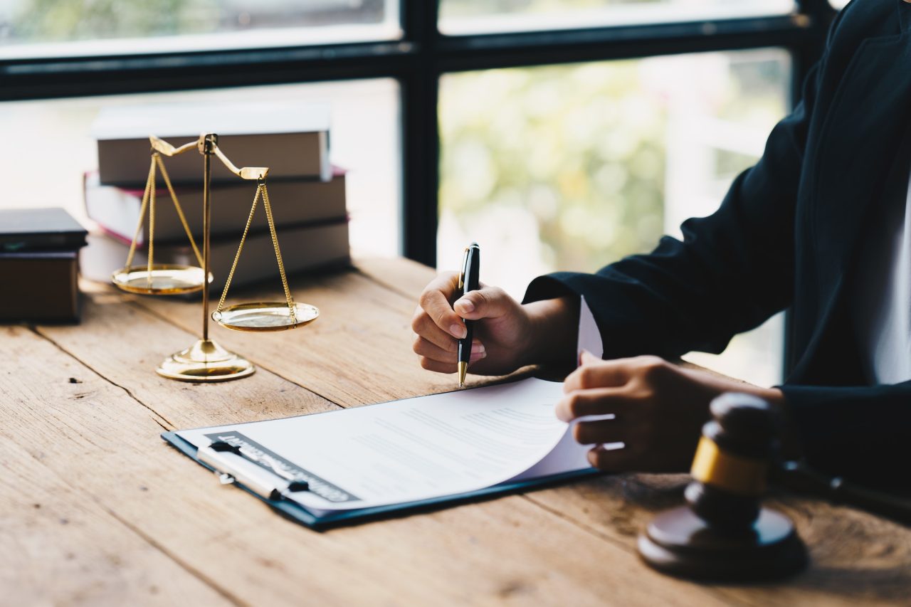 businessman-in-suit-or-lawyer-working-on-a-documents-legal-law